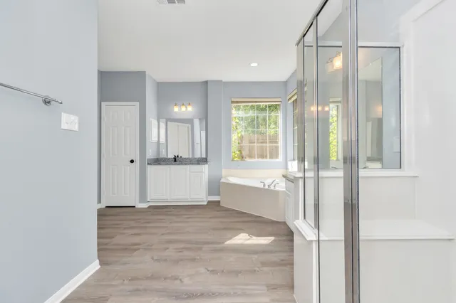 a view of an empty room and window