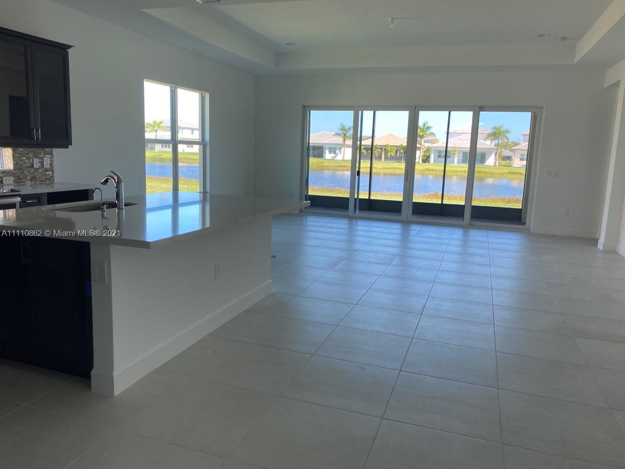 Polo Trace Delray Beach, FL 33446 - Photo 12 of 40 a view of an empty room with a window