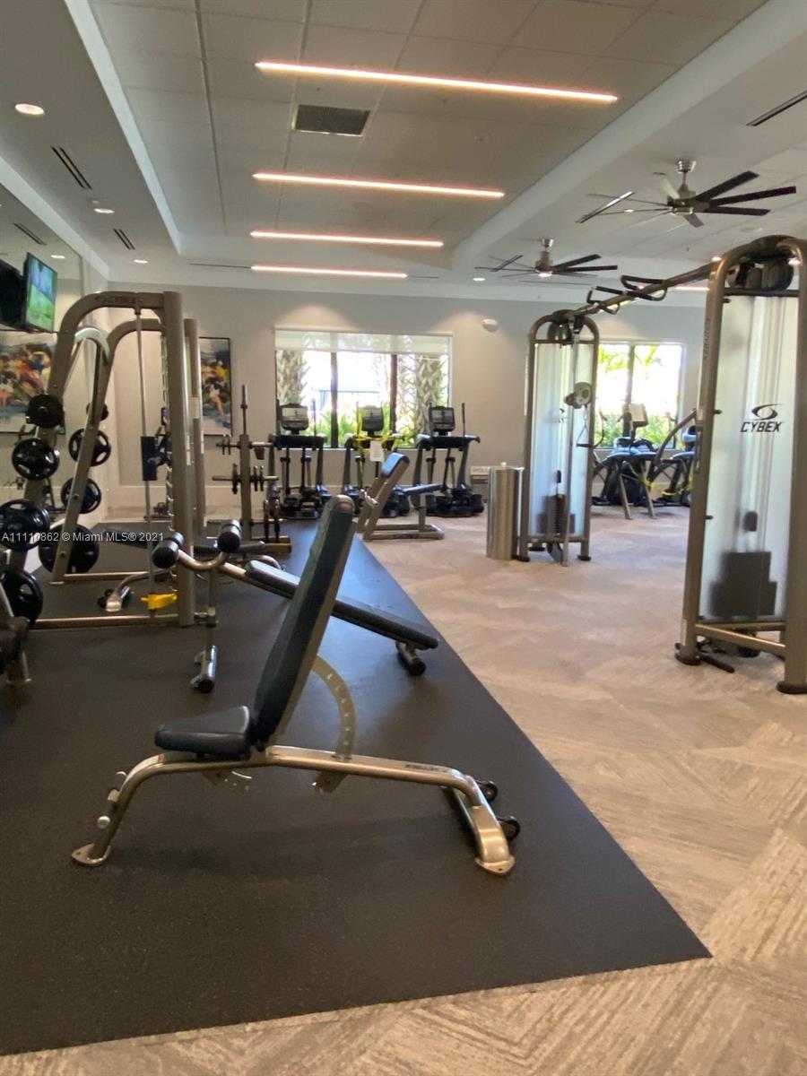 Polo Trace Delray Beach, FL 33446 - Photo 26 of 40 a gym room with gym equipment