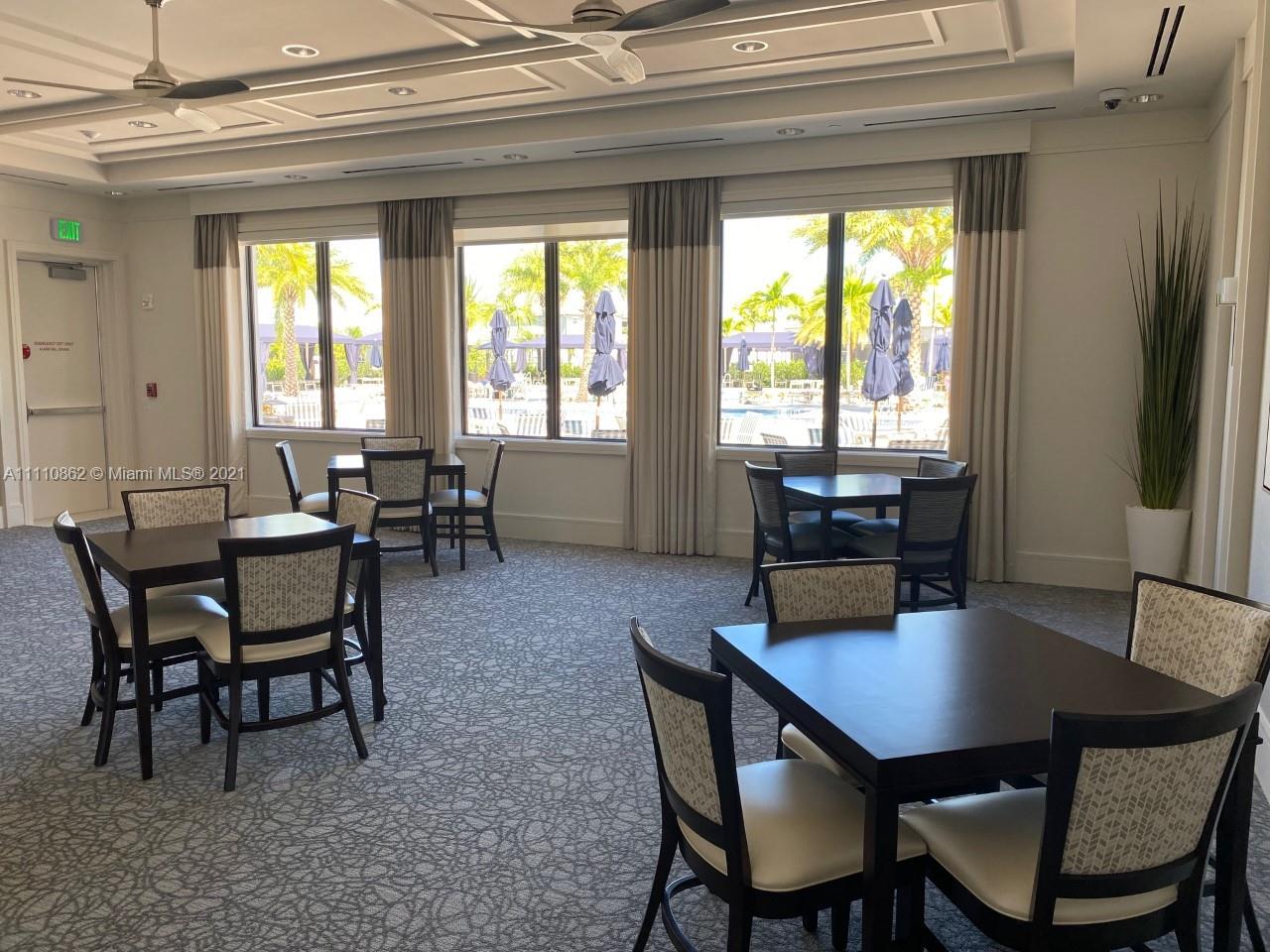 Polo Trace Delray Beach, FL 33446 - Photo 31 of 40 a view of a dining room with furniture and window