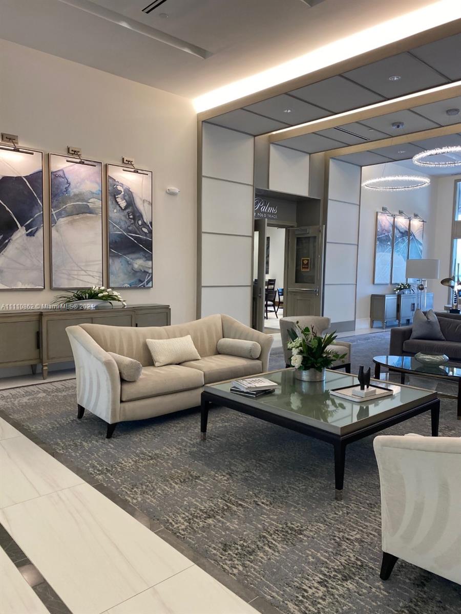 Polo Trace Delray Beach, FL 33446 - Photo 35 of 40 a living room with furniture and a wooden floor