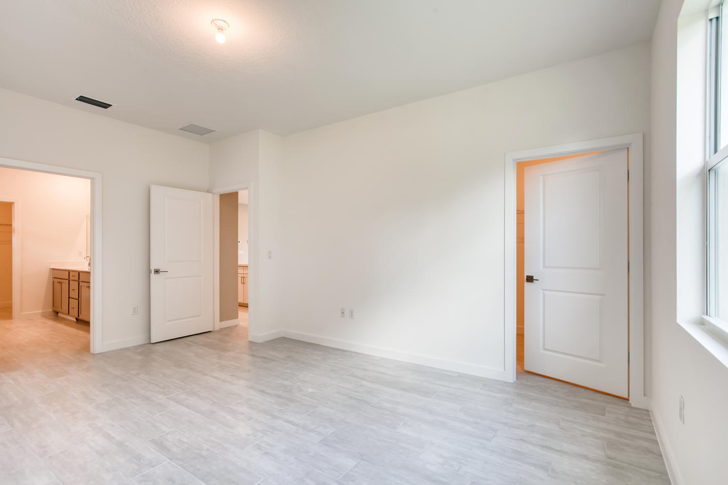 2173 Southwest Raspberry Place Palm City, FL 34990 - Photo 11 of 18 Clifton-large-010-014-Master Bedroom-150