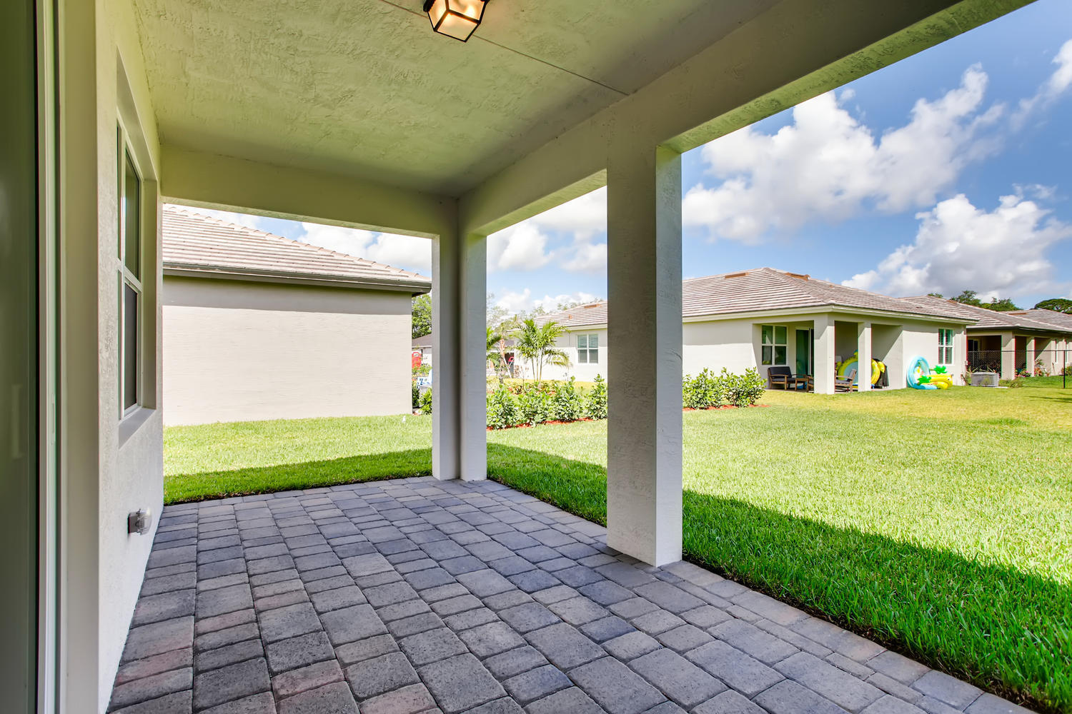 2173 Southwest Raspberry Place Palm City, FL 34990 - Photo 17 of 18 Clifton-large-016-016-Patio-1500x1000-72