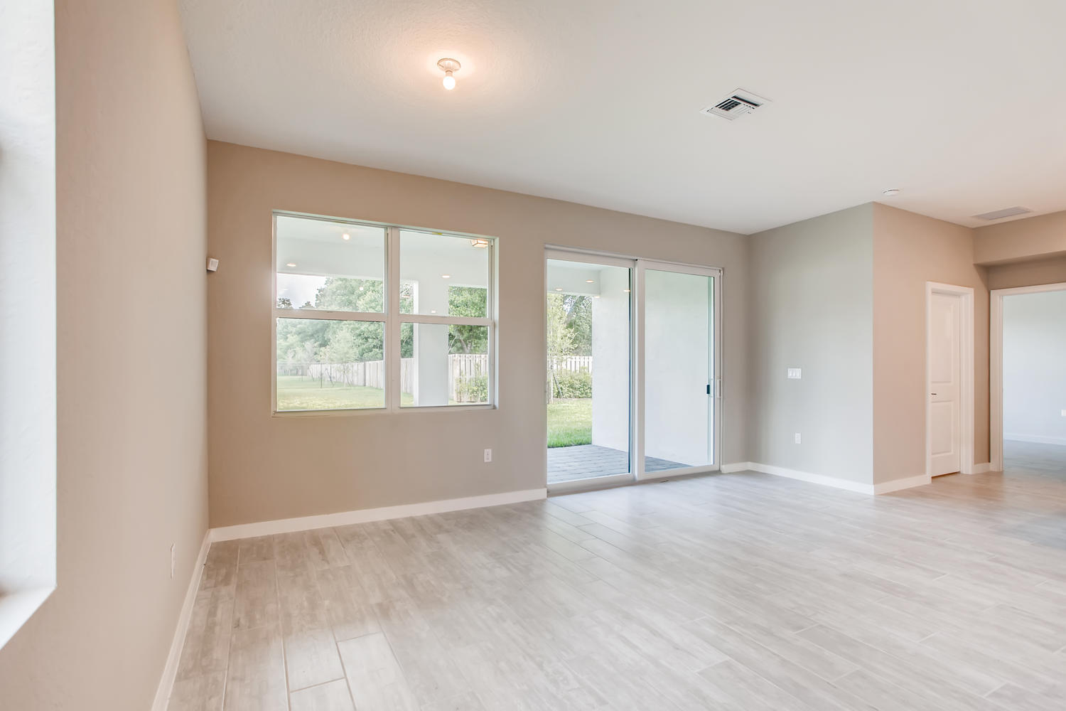 2173 Southwest Raspberry Place Palm City, FL 34990 - Photo 4 of 18 Clifton-large-003-001-Living Room-1500x1