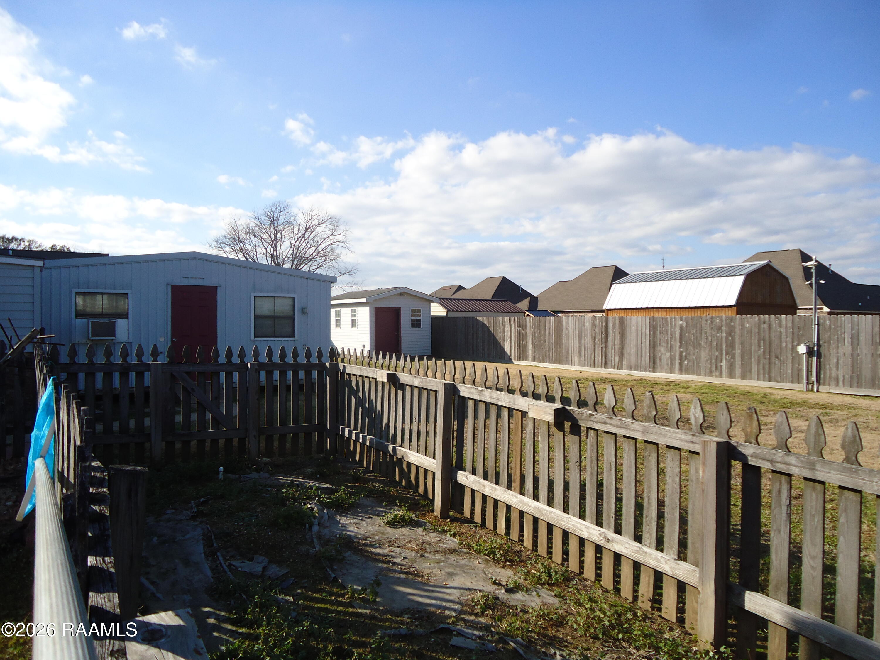 101 Rue Beau Soleil Broussard, LA 70518 - Photo 25 of 27 101 Rue Beau Soleil yard with 2 extra st