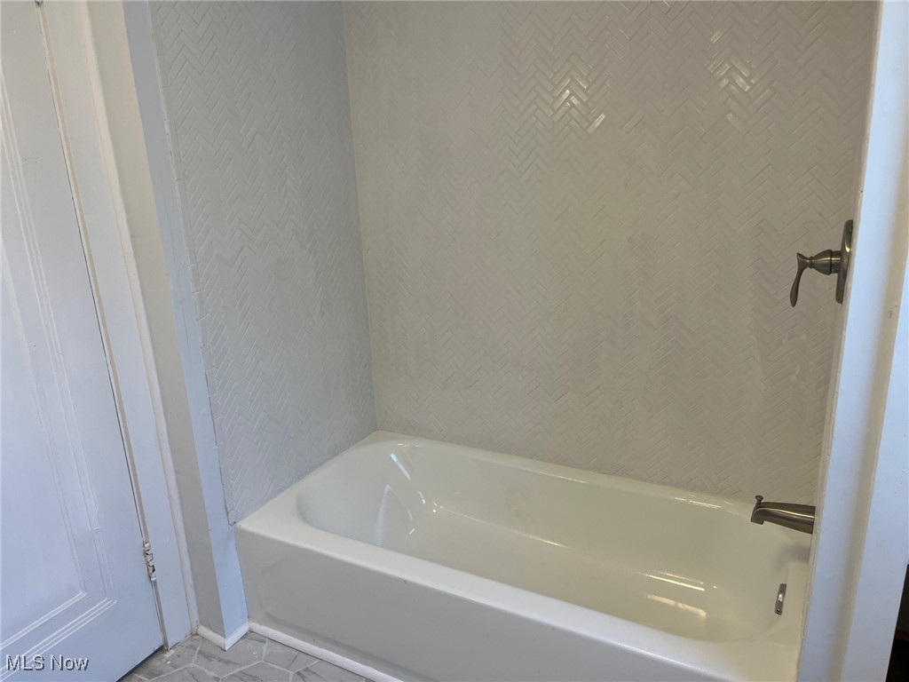1148 Sylvania Road Cleveland Heights, OH 44121 - Photo 22 of 30 Bathroom featuring a bath and tile patterned flooring