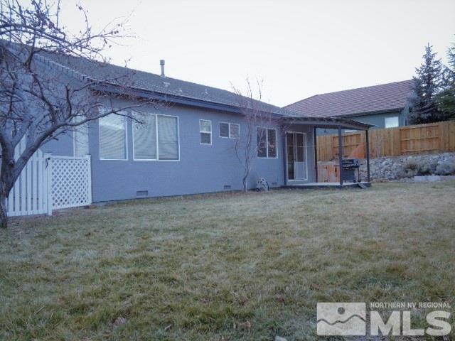 5555 Tappan Drive Reno, NV 89523 - Photo 5 of 11 a house that has a tree in front of it