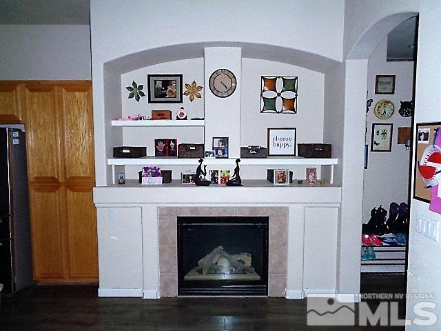 5555 Tappan Drive Reno, NV 89523 - Photo 8 of 11 a living room with furniture and a fireplace