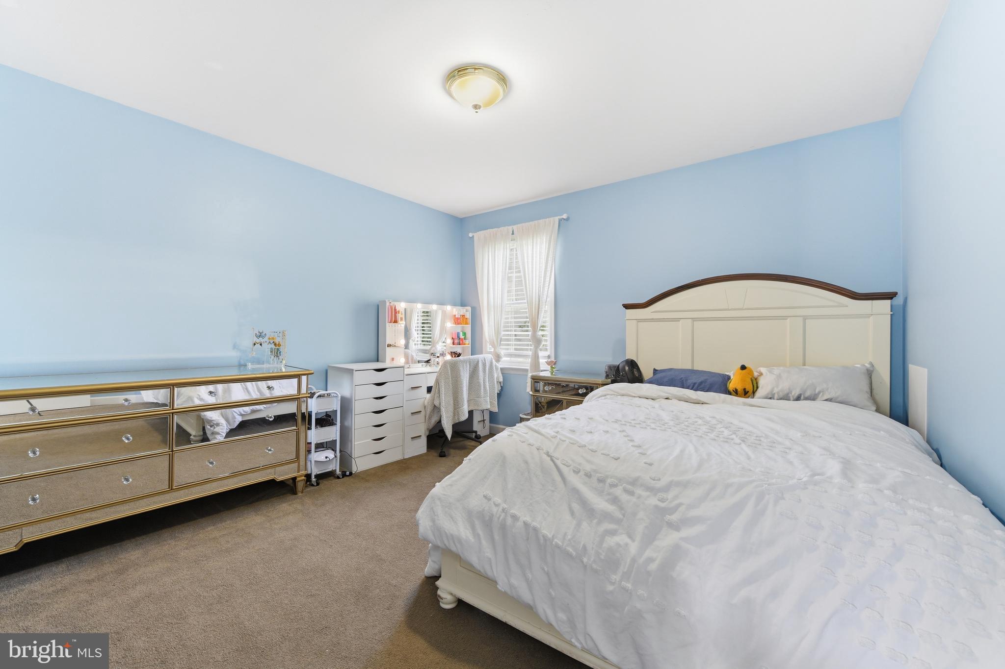 3121 South Wagner Circle Sinking Spring, PA 19608 - Photo 22 of 30 a bedroom with a bed and dresser