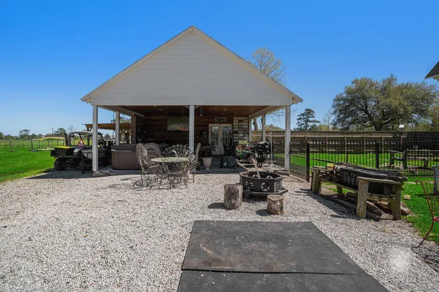 a view of a balcony with furniture