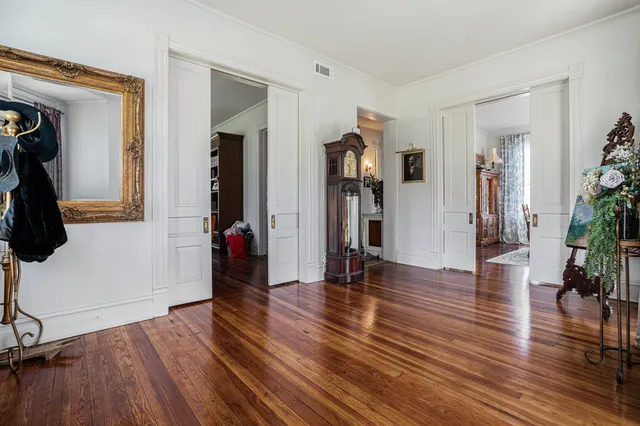 a living room with furniture flat screen tv and a fireplace