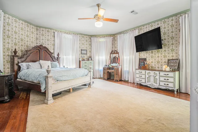 a view of utility room and bedroom