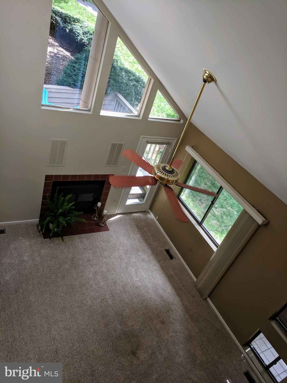 2272 Compass Point Lane Reston, VA 20191 - Photo 5 of 25 a living room with furniture and a window