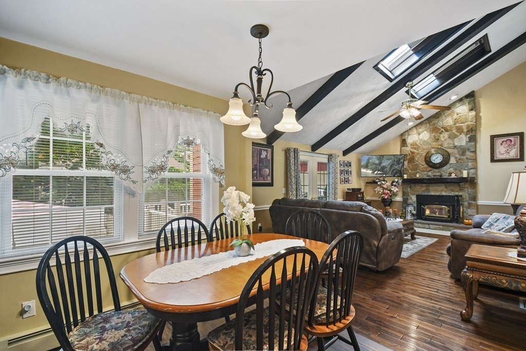 33 Old Farm Road Reading, MA 01867 - Photo 17 of 42 a view of a dining room with furniture window and wooden floor
