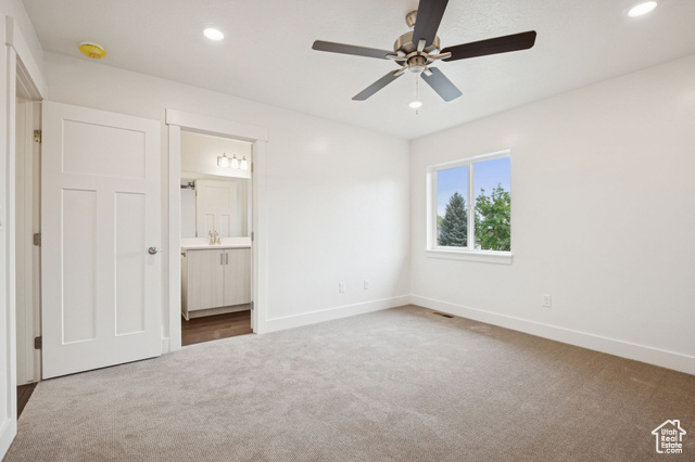 1615 North Angel Street, Unit F Layton, UT 84041 - Photo 14 of 45 Unfurnished bedroom featuring carpet flooring, recessed lighting, a ceiling fan, and connected bathroom