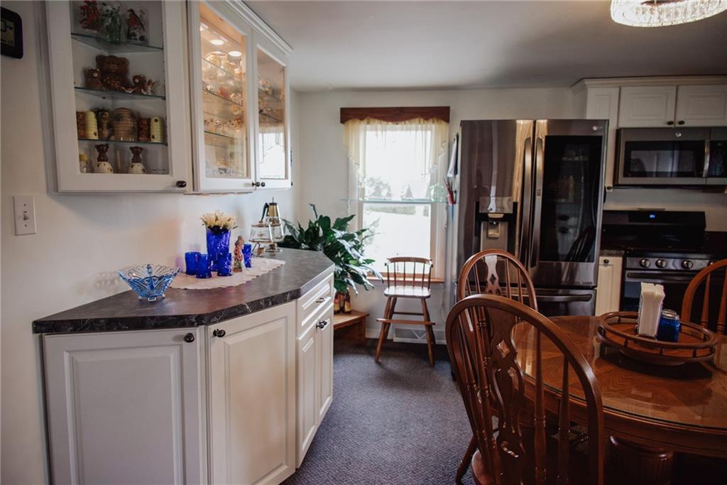 110 Schnur Road Butler, PA 16002 - Photo 11 of 24 a kitchen that has a table and chairs in it
