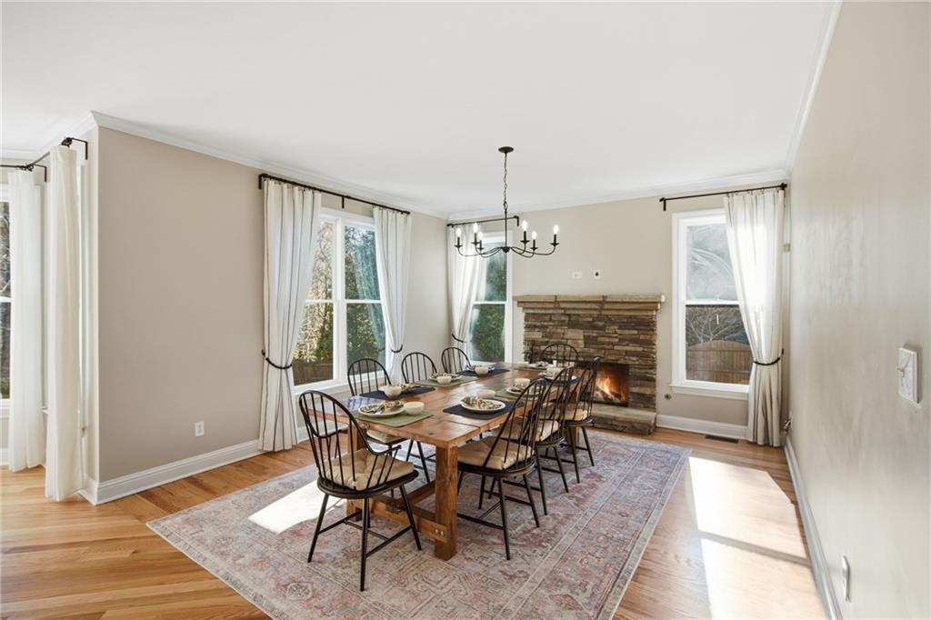 1830 Callaway Ridge Drive Northwest Kennesaw, GA 30152 - Photo 22 of 60 a view of a dining room with furniture window and outside view