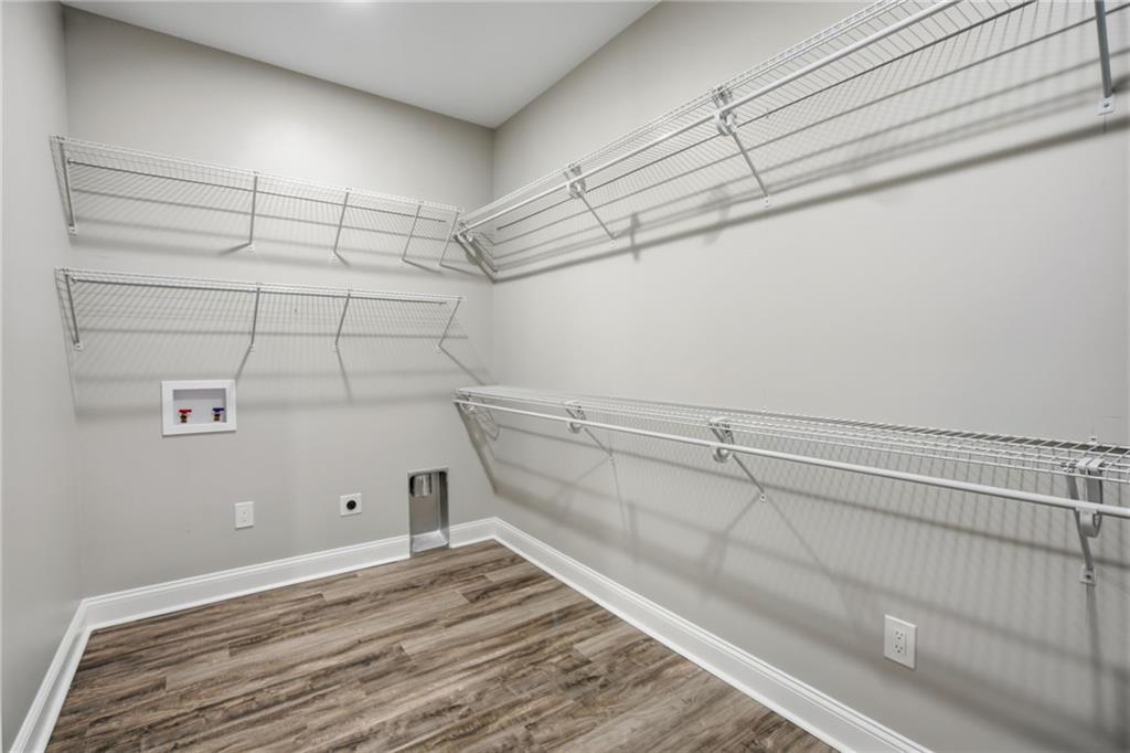 1830 Callaway Ridge Drive Northwest Kennesaw, GA 30152 - Photo 46 of 60 a view of a room with racks on the wall