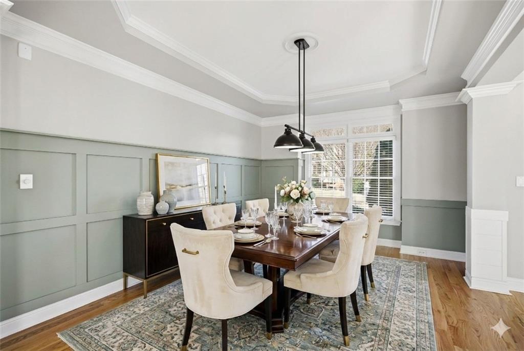 1830 Callaway Ridge Drive Northwest Kennesaw, GA 30152 - Photo 9 of 60 a view of a dining room with furniture window and wooden floor