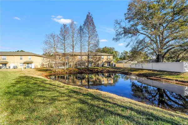 a view of swimming pool with outdoor seating