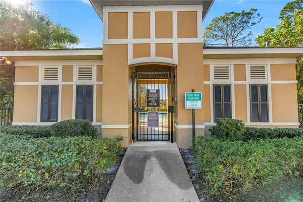 a view of a swimming pool with an outdoor seating