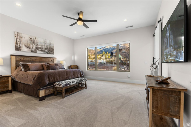 1210 East Bristle Cone Road Pine Valley, UT 84781 - Photo 13 of 54 Primary Bedroom with light colored carpet, ceiling fan, and recessed lighting