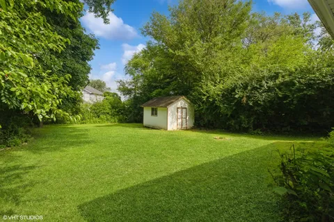 a house with huge green field