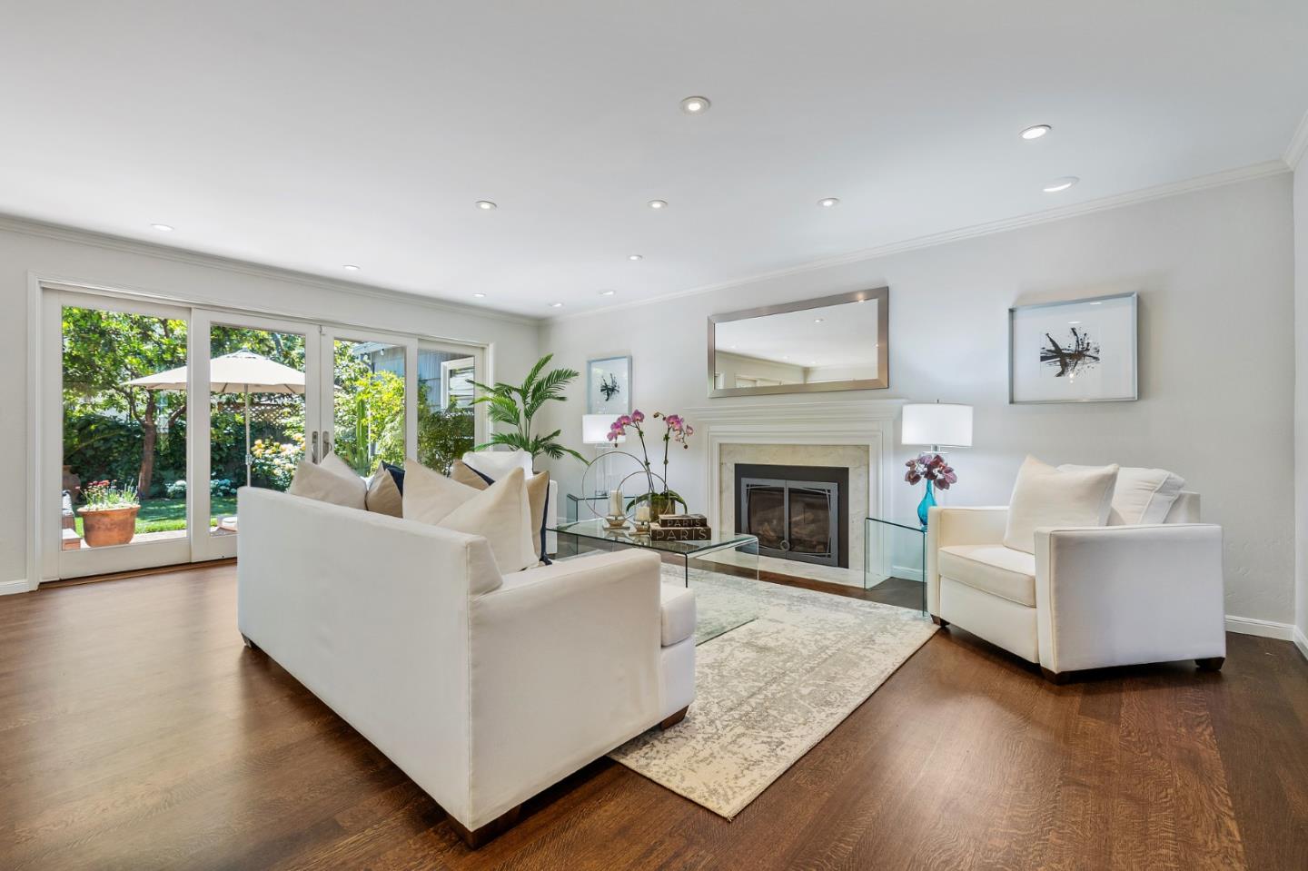 514 Alhambra Road San Mateo, CA 94402 - Photo 3 of 16 a living room with furniture and a fireplace