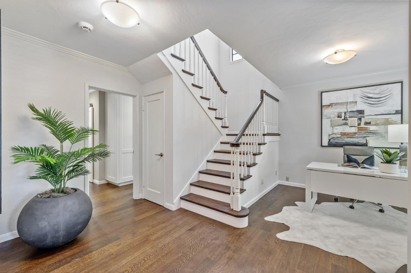 514 Alhambra Road San Mateo, CA 94402 - Photo 6 of 16 a view of entryway and hall with wooden floor