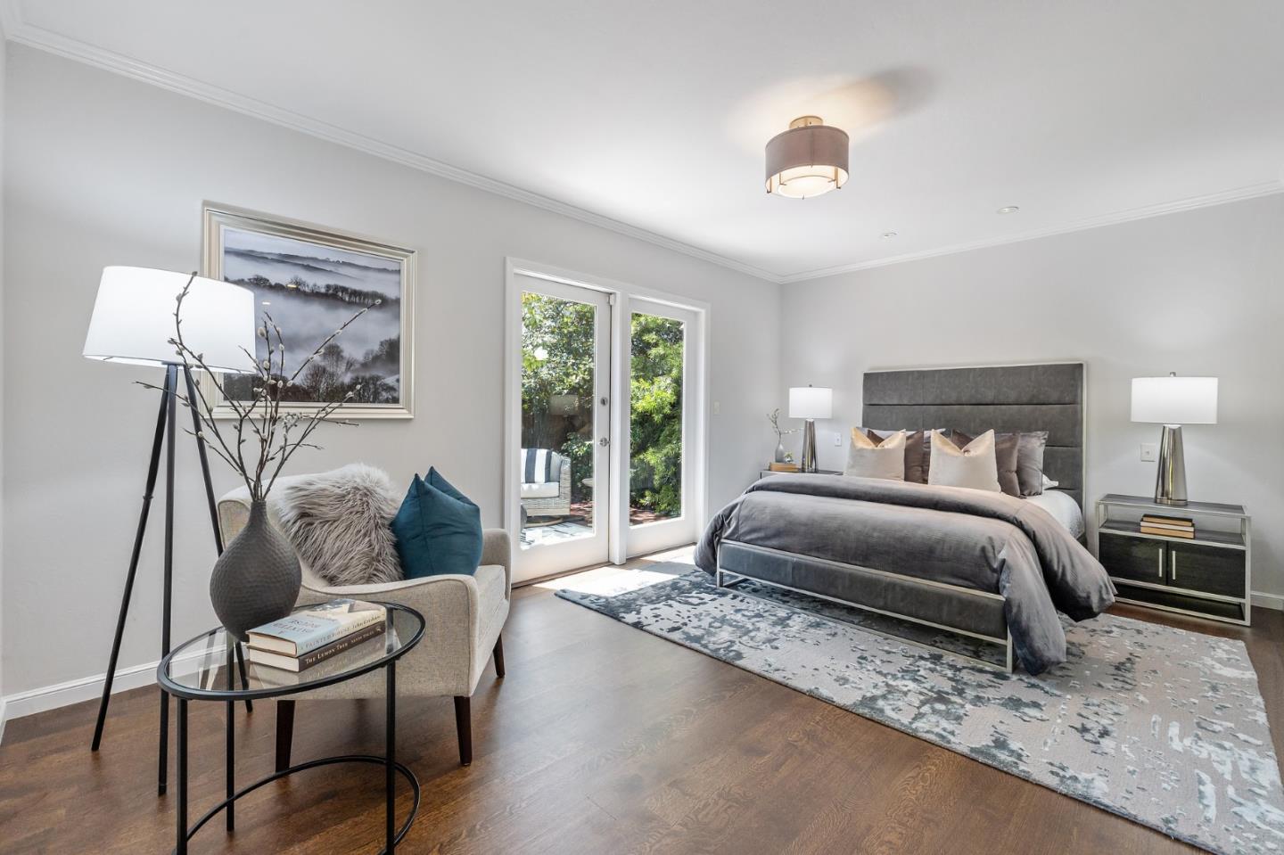 514 Alhambra Road San Mateo, CA 94402 - Photo 8 of 16 a bedroom with a bed and wooden floor