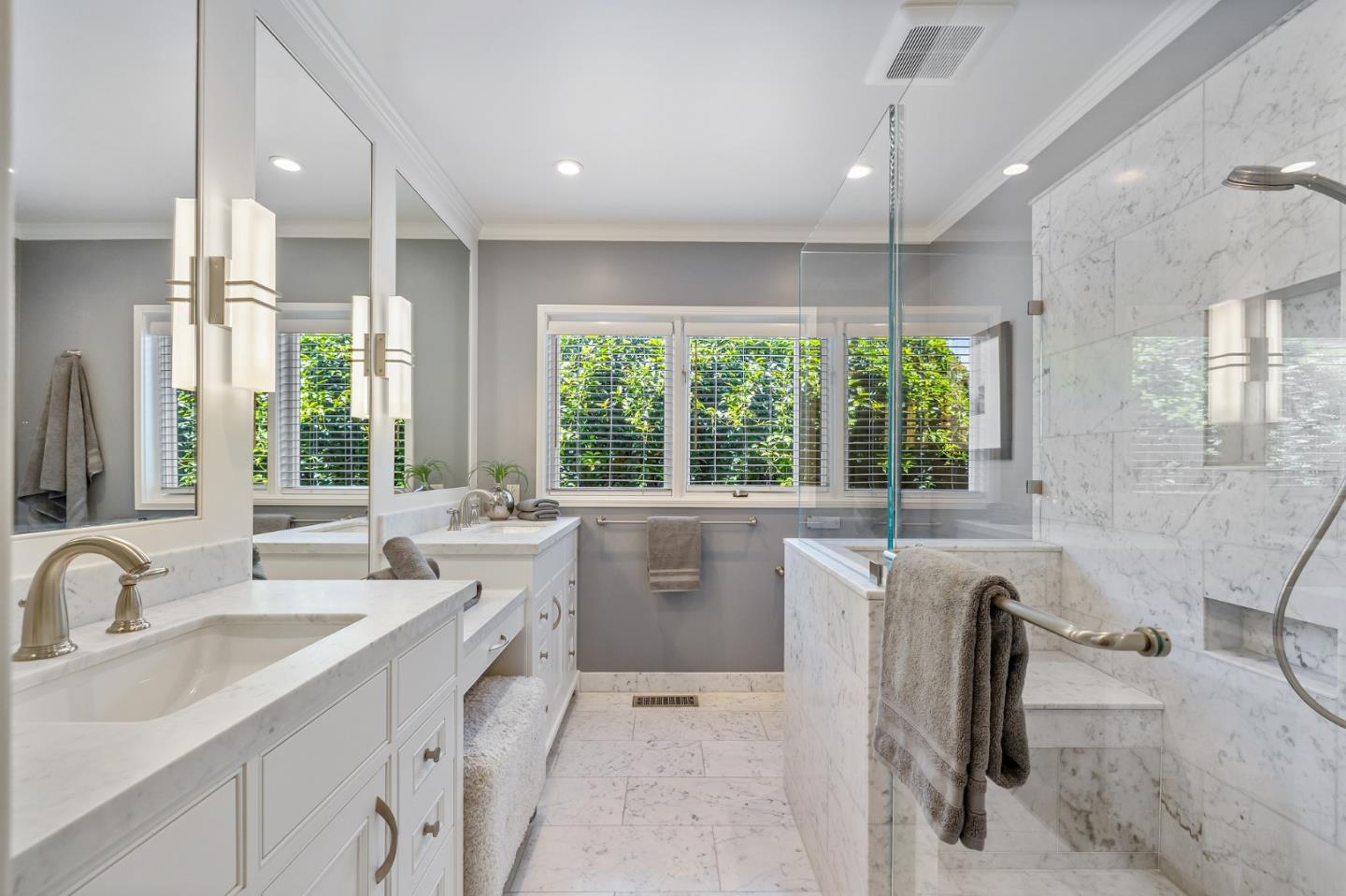 514 Alhambra Road San Mateo, CA 94402 - Photo 9 of 16 a large kitchen with kitchen island a large window cabinets and stainless steel appliances