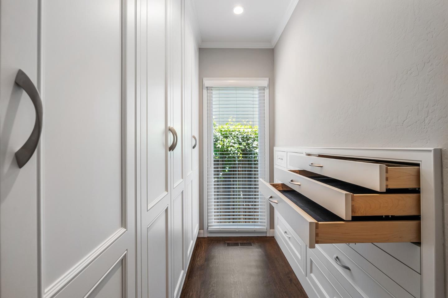 514 Alhambra Road San Mateo, CA 94402 - Photo 10 of 16 a view of a hallway with windows and stairs