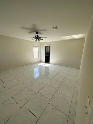 en empty room with windows