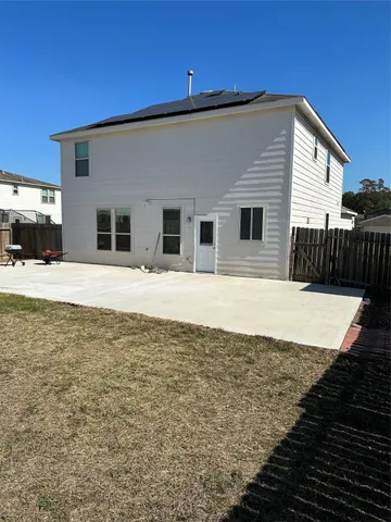a house view with a outdoor space