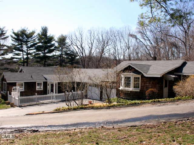 9 Laurel Hill Road Ridgefield, CT 06877 - Photo 1 of 1 a view of a house with a patio