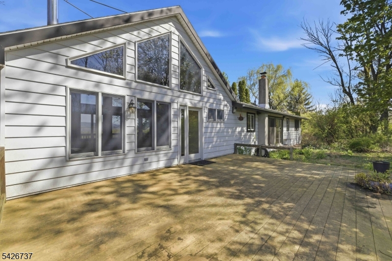 117 Linaberry Road Columbia, NJ 07832 - Photo 22 of 36 a view of a house with a yard