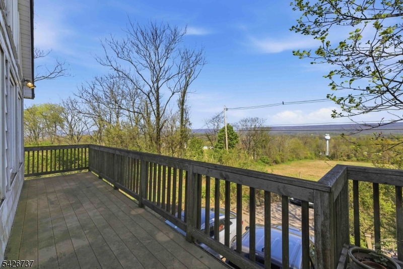 117 Linaberry Road Columbia, NJ 07832 - Photo 34 of 36 a view of a balcony with wooden fence