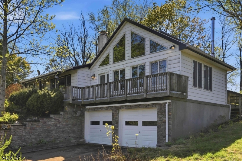 117 Linaberry Road Columbia, NJ 07832 - Photo 4 of 36 a front view of a house with a yard