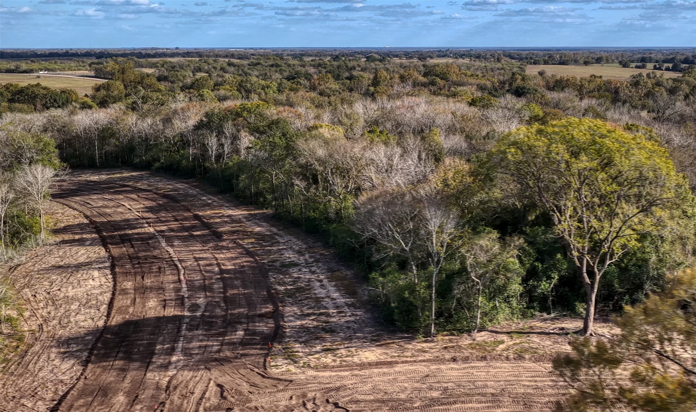 33 Windmill Ridge Brenham, TX 77833 - Photo 3 of 9 a view of a yard