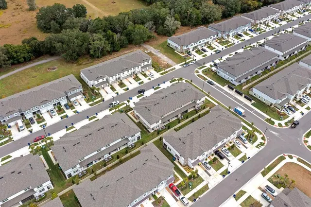 an aerial view of residential building with outdoor space