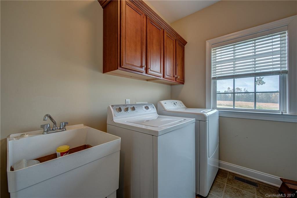 1072 Arabian Farm Road, Unit 9 Clover, SC 29710 - Photo 18 of 24 a utility room with dryer and washer