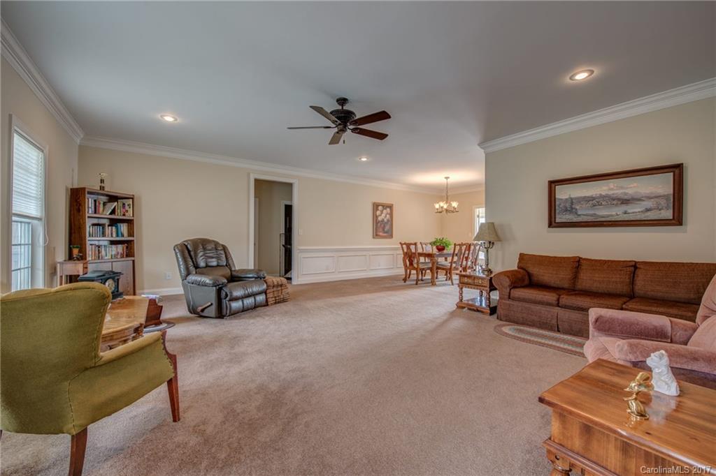 1072 Arabian Farm Road, Unit 9 Clover, SC 29710 - Photo 4 of 24 a living room with furniture and a gym machine