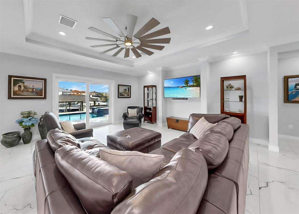 901 Capriccio Lane Apollo Beach, FL 33572 - Photo 11 of 83 a living room with furniture and a large window