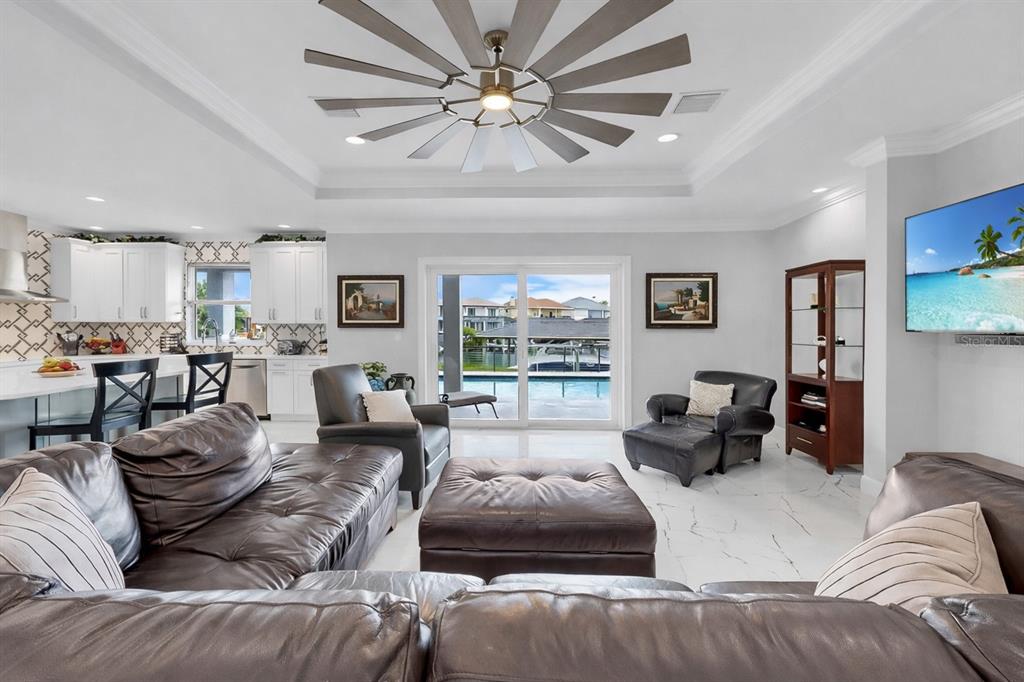 901 Capriccio Lane Apollo Beach, FL 33572 - Photo 12 of 83 a living room with furniture and a large window