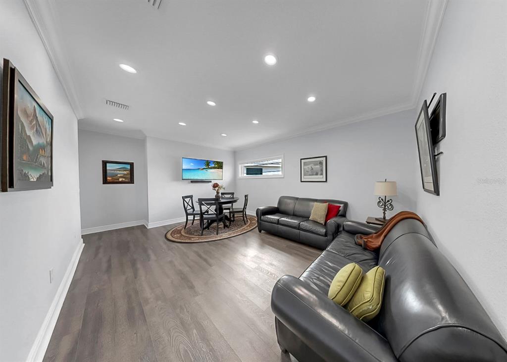 901 Capriccio Lane Apollo Beach, FL 33572 - Photo 42 of 83 a living room with furniture and wooden floor