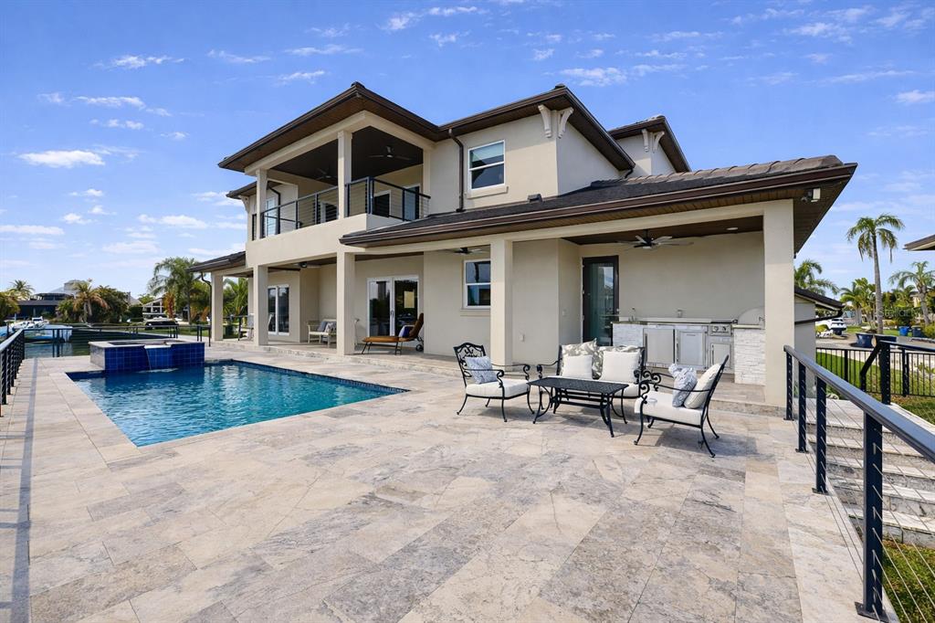 901 Capriccio Lane Apollo Beach, FL 33572 - Photo 5 of 83 a view of a house with swimming pool and sitting area