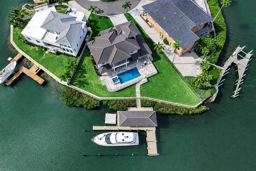 901 Capriccio Lane Apollo Beach, FL 33572 - Photo 63 of 83 an aerial view of a house with swimming pool patio and outdoor seating