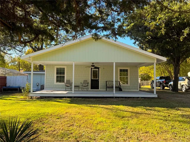 a view of pool with outdoor seating