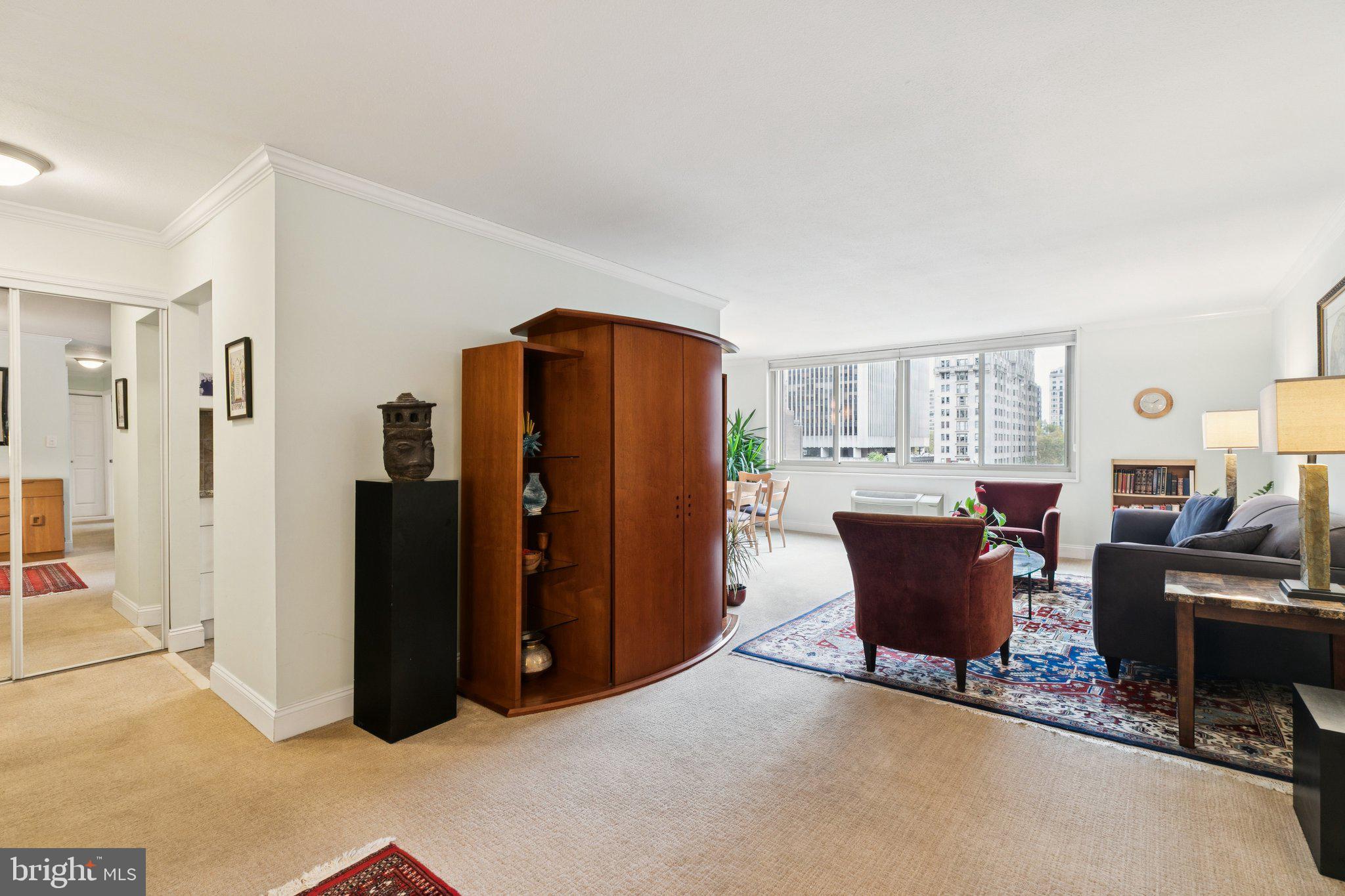 1919 Chestnut Street, Unit 707 Philadelphia, PA 19103 - Photo 3 of 36 a workspace with furniture and a window