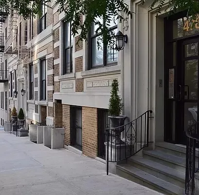 front view of a house with a street